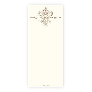 A tall, narrow cream-colored notepad or letterhead pad with an ornate brown decorative emblem and the text 'LAINGE LAIS LES PEURS ROUBLER' printed near the top, shown on a plain white background.