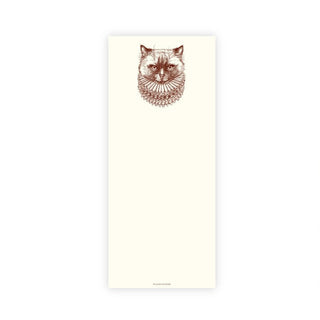 A tall cream-colored rectangular notepad featuring a detailed brown line art illustration of a cat's face at the top center, shown against a white background with partial descriptive text on the right.