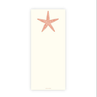 A vertical cream-colored notepad featuring a textured,  coral-pink starfish near the top center, set against a plain white background.