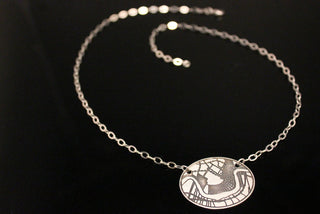 CRESCENT CITYSCAPE OVAL SILVER NECKLACE