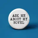 ASK ME ABOUT MY NOVEL PINBACK BUTTON 1”